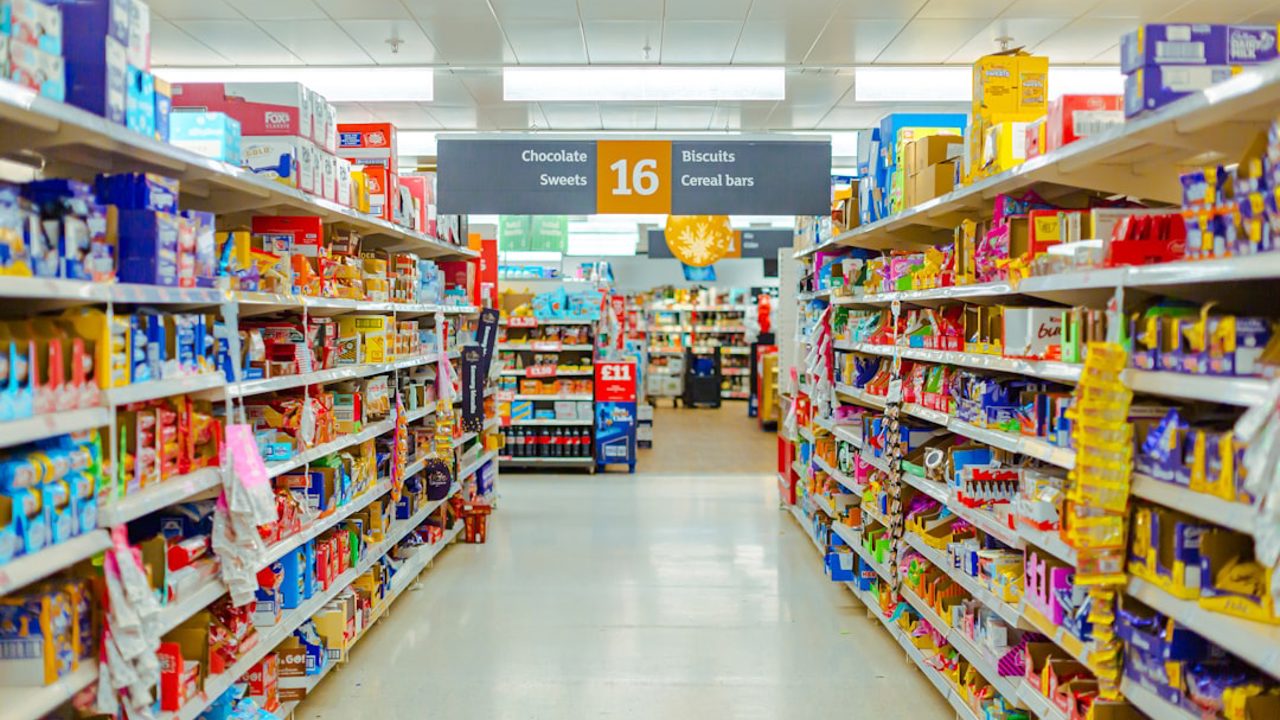 A snack aisle in a supermarket. London, United Kingdom.